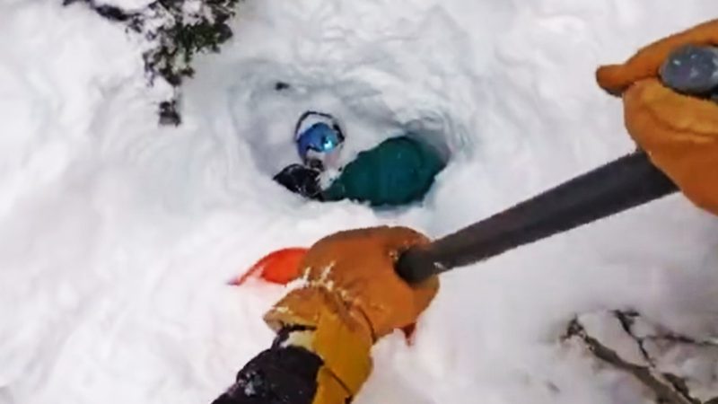 'I got you': Skier saves a lone snowboarder buried under 6ft of snow in hectic viral video